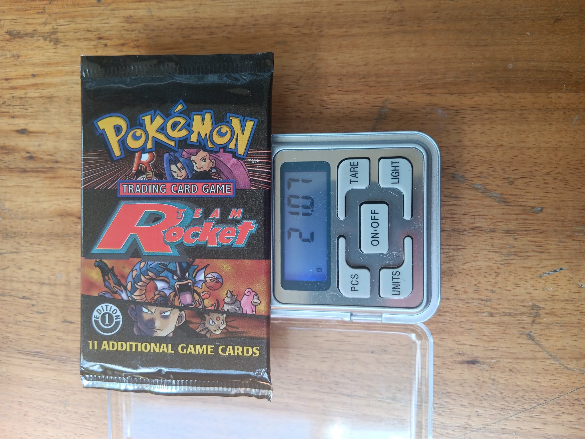 WOTC 1st Edition Team Rocket Booster Pack (weighing 21.07)| Treasure  Collectables